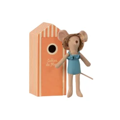 Mor strandmus med strandhus