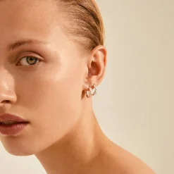 ZION Huggie Øreringe Small, gold plated